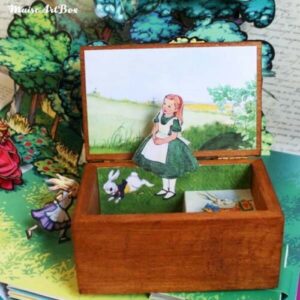 Carillon scatola portagioie pop-up Alice in Wonderland